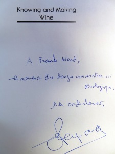 Emile Peynaud presents a copy of his classic "Knowing and Making Wine" to Frank Ward, following a "long conversation about oenology" in his home in Talence.